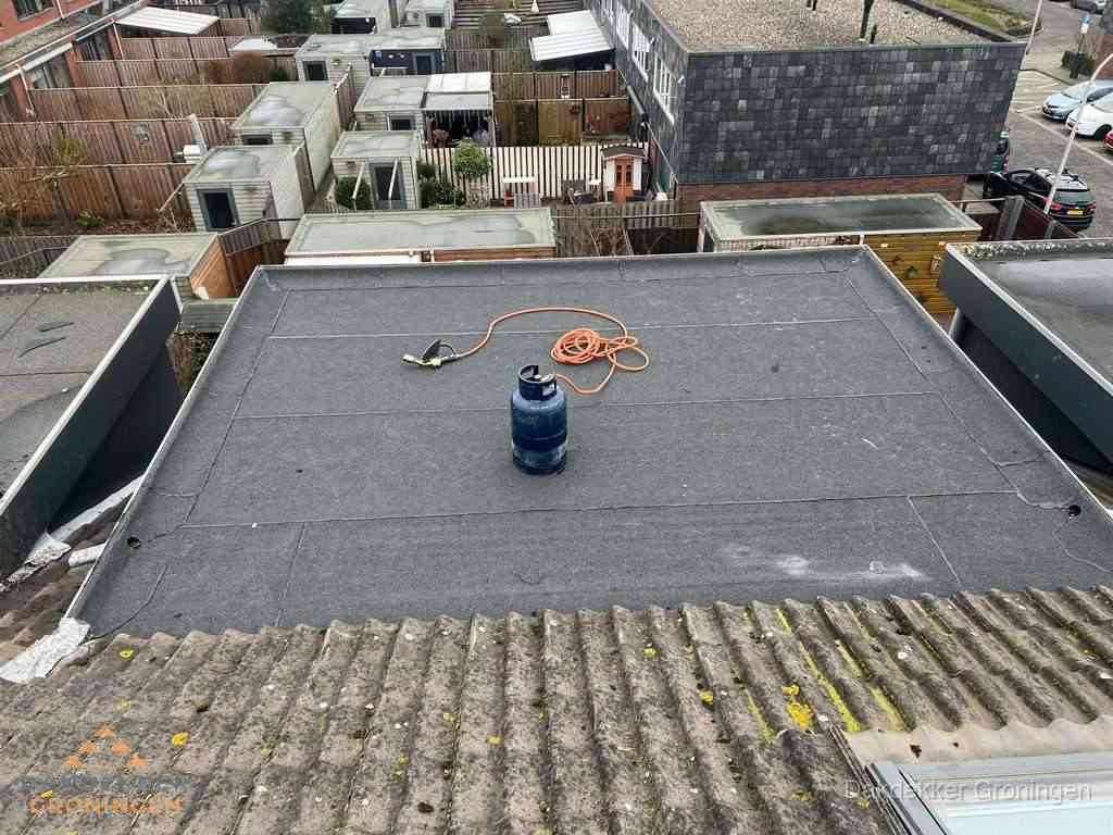 Dakreparatie plat dak met bitumen in Groningen Dakreparatie plat dak met bitumen in Groningen